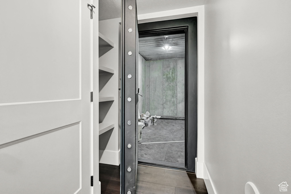 Doorway featuring wood finished floors