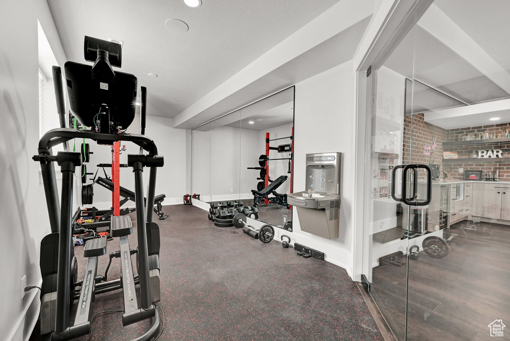 Workout area featuring recessed lighting and baseboards