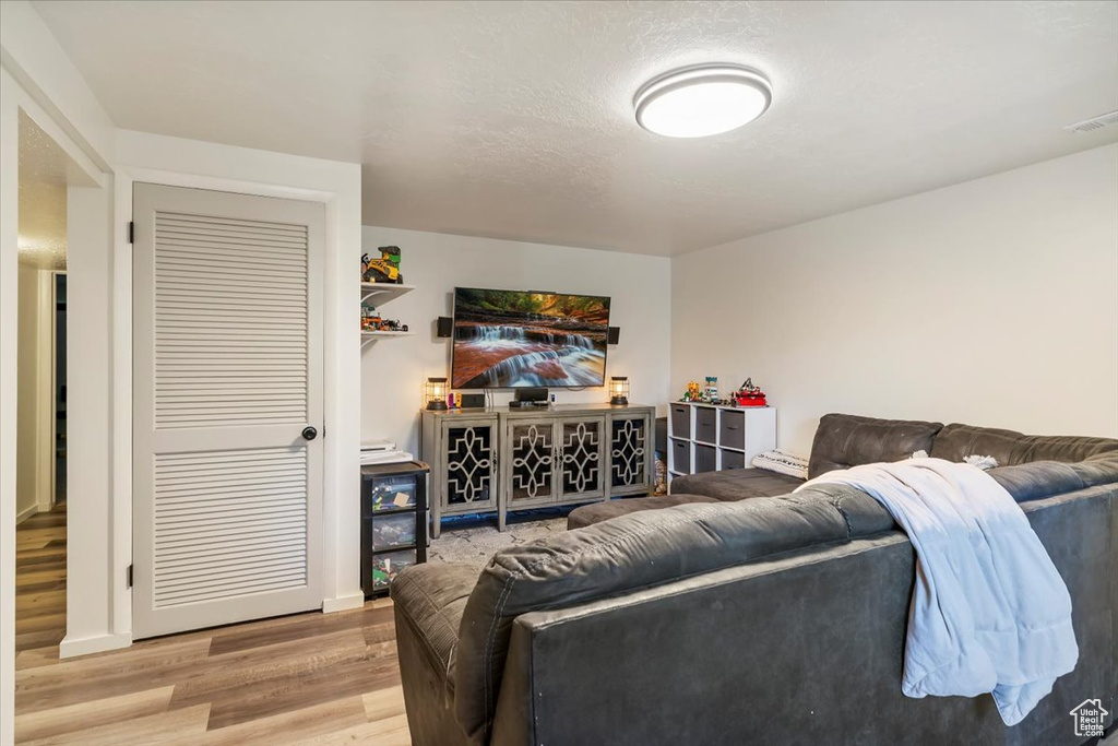 Living area with wood finished floors