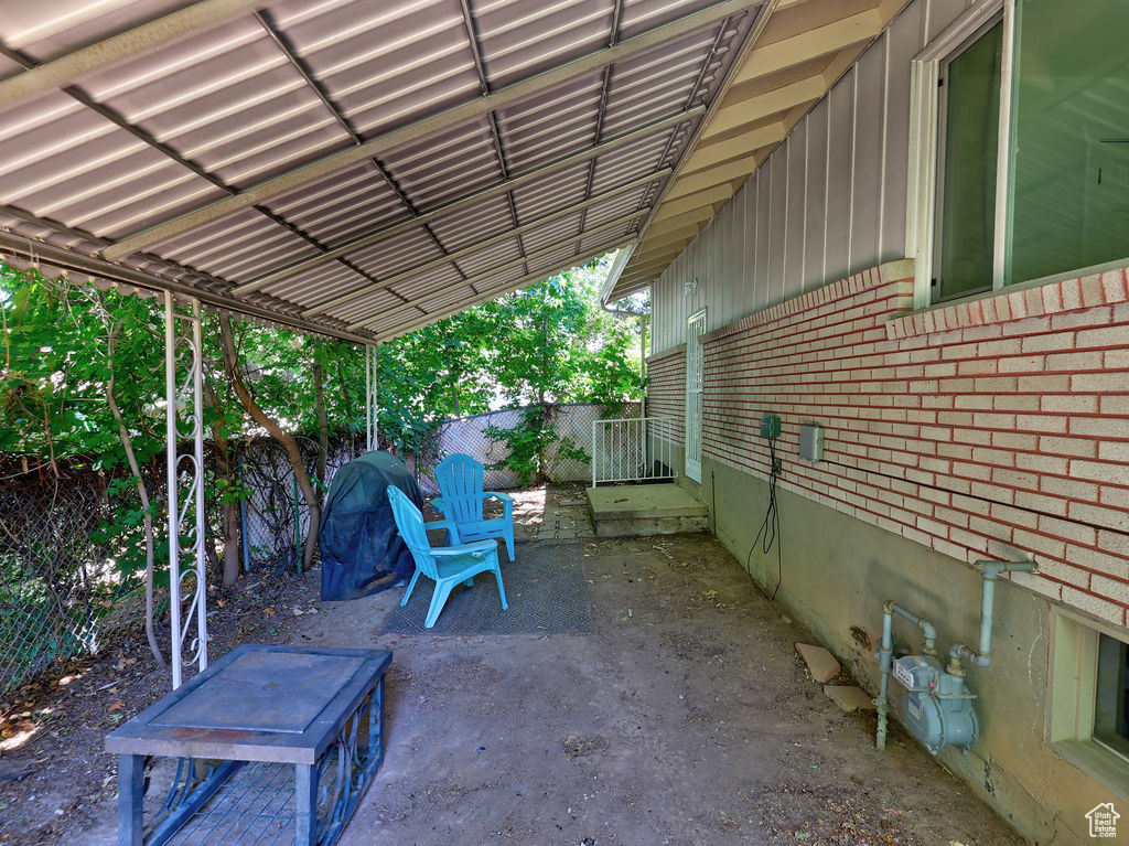 Fenced backyard featuring a patio area