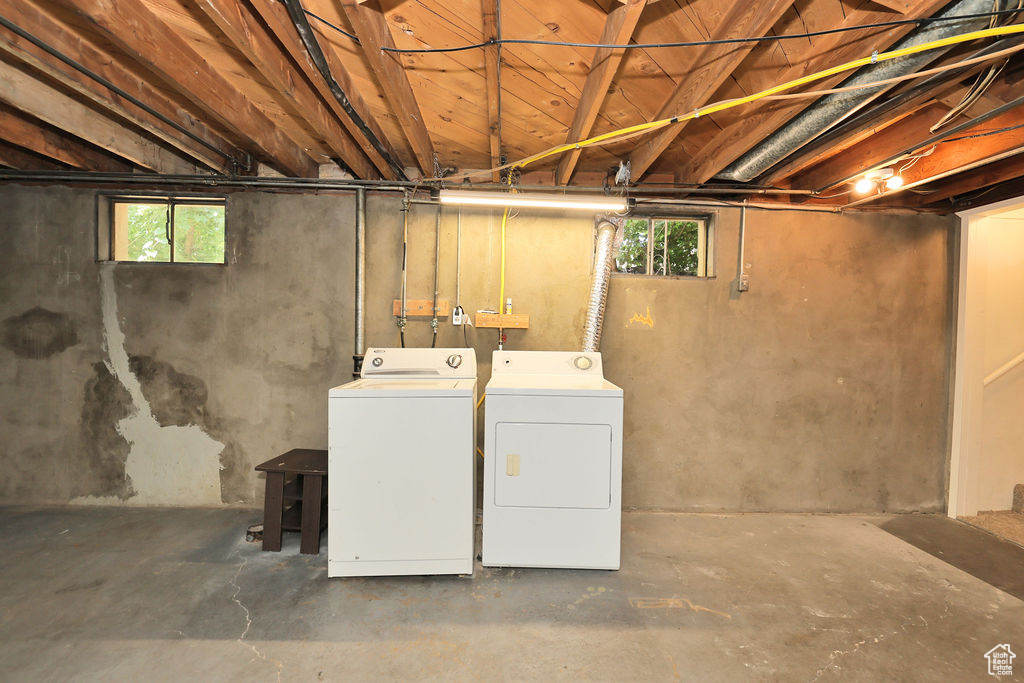 Basement featuring independent washer and dryer