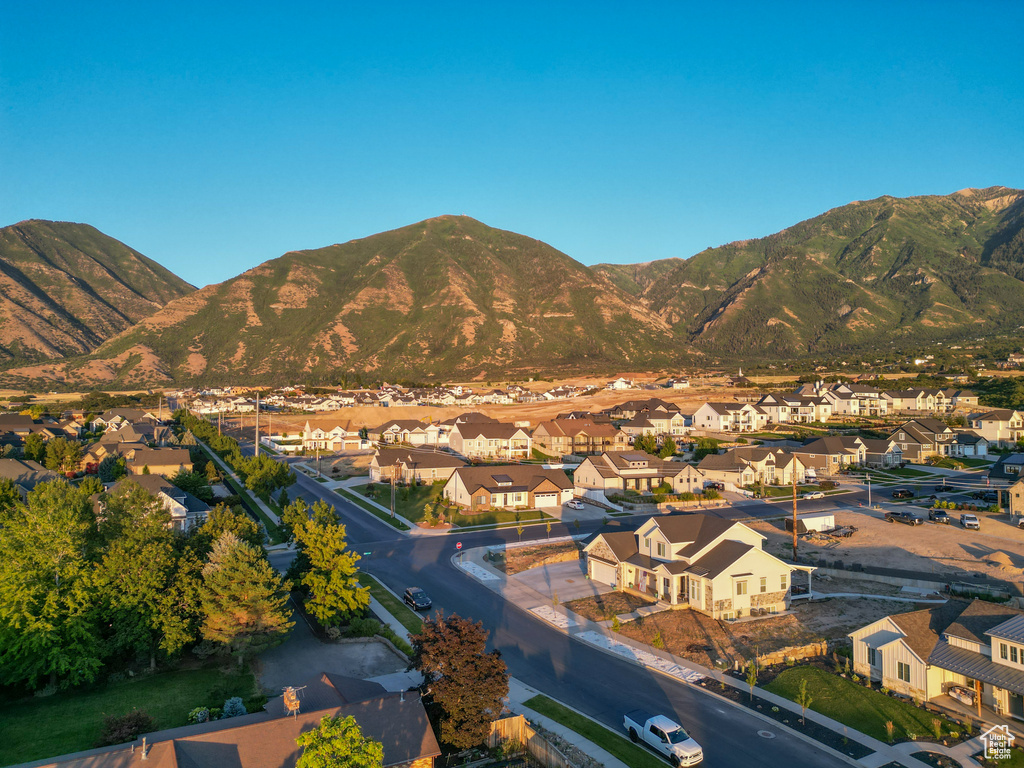 Mountain view featuring nearby suburban area