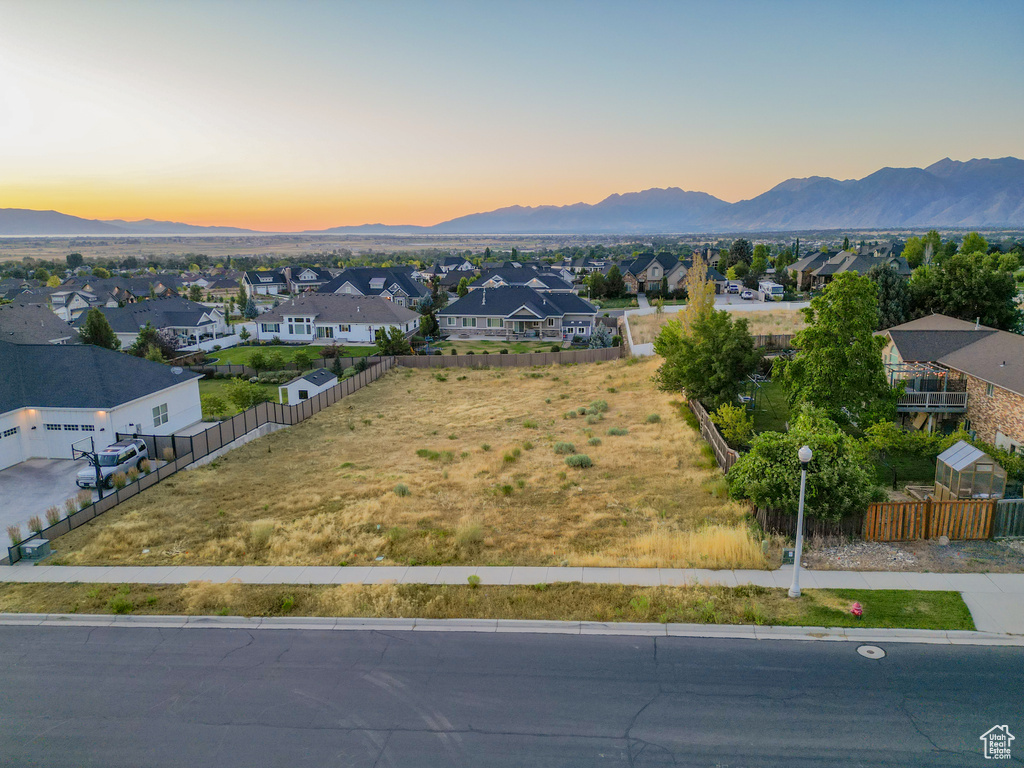Aerial view of residential area with a mountainous background