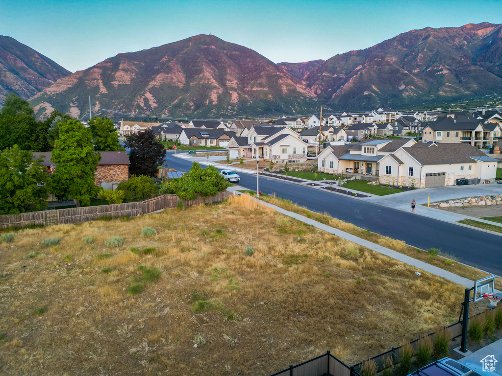 View of mountain background featuring nearby suburban area