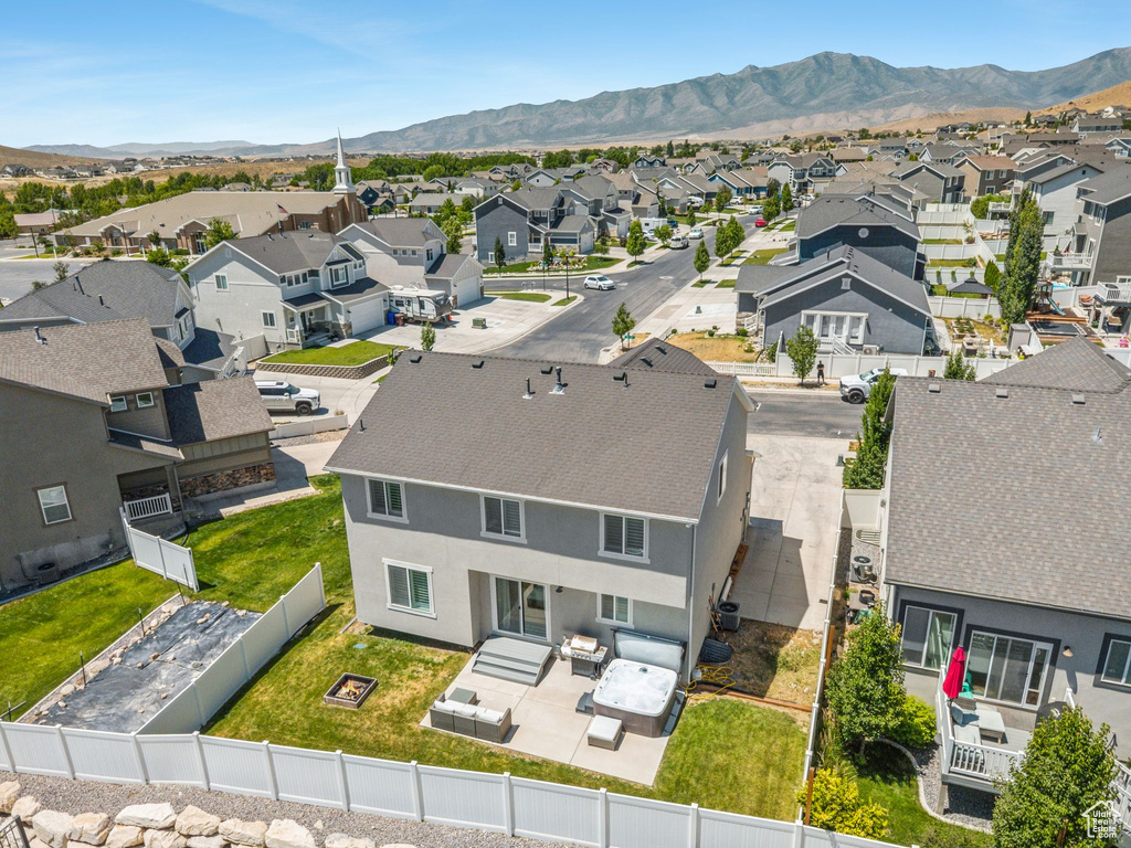 Aerial view of residential area with mountains