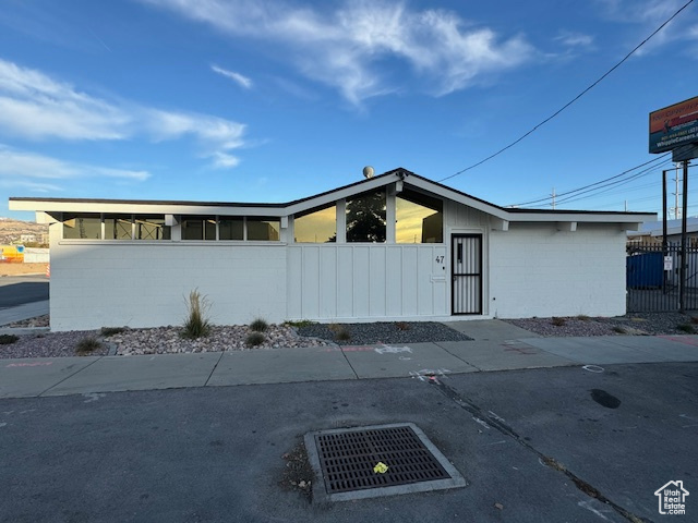 Mid-century inspired home featuring concrete block siding