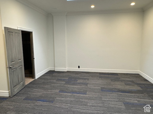 Spare room with carpet floors, crown molding, and recessed lighting