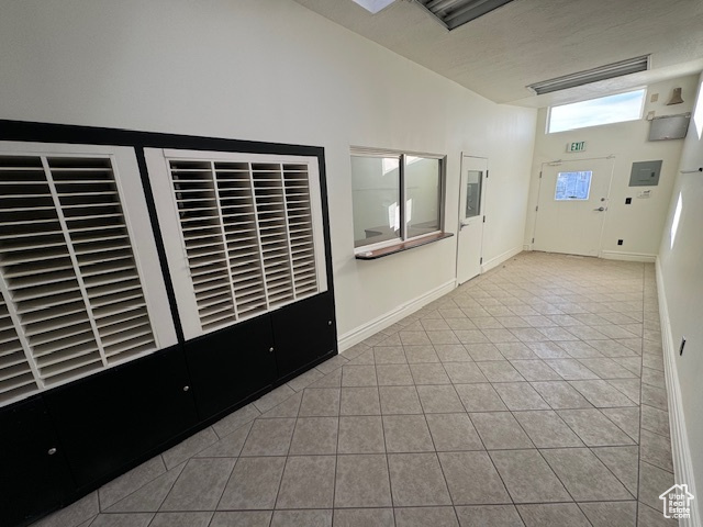 Spare room featuring tile patterned floors
