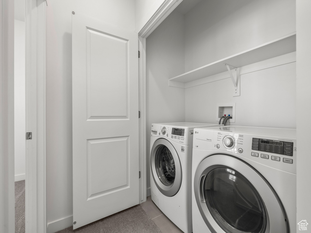 Washroom featuring separate washer and dryer