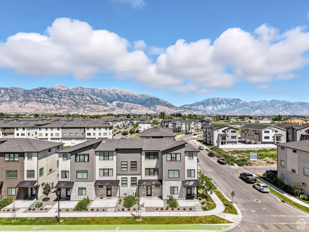 View of mountain background featuring nearby suburban area
