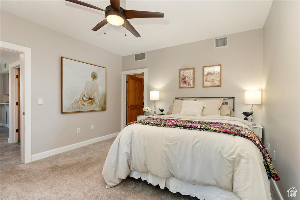Bedroom with carpet and ceiling fan