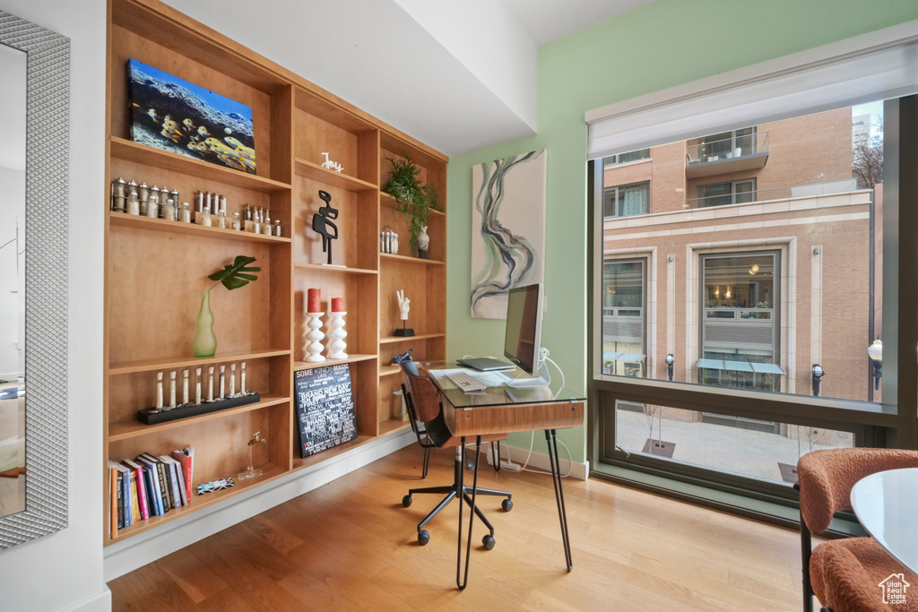 Office space featuring wood finished floors