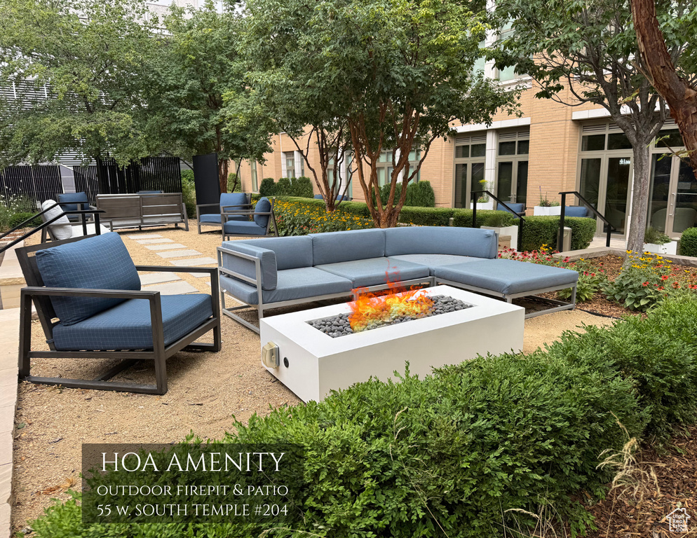 View of home\\\\\\\\\\\\\\\\\\\\\\\\\\\\\\\\\\\\\\\\\\\\\\\\\\\\\\\\\\\\\\\'s community featuring a patio and an outdoor living space with a fire pit