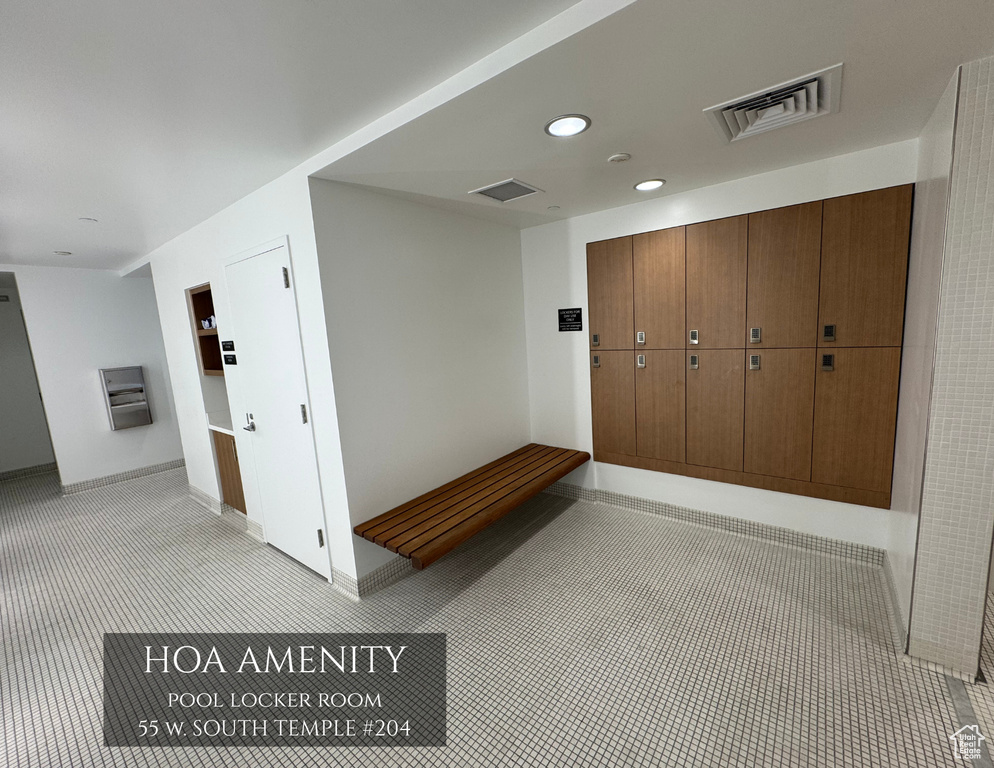 Corridor featuring recessed lighting and carpet floors