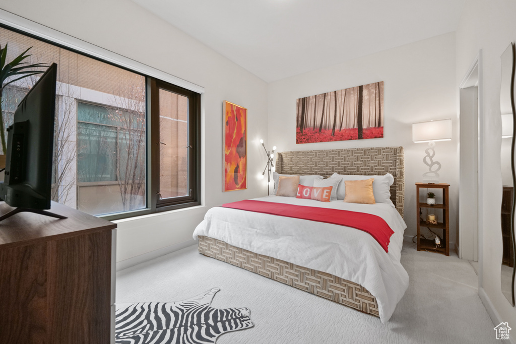 Bedroom with carpet flooring