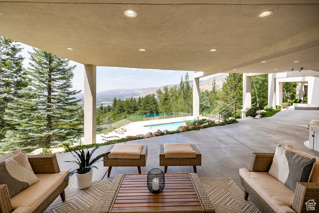 View of patio / terrace featuring a mountain view and an outdoor hangout area