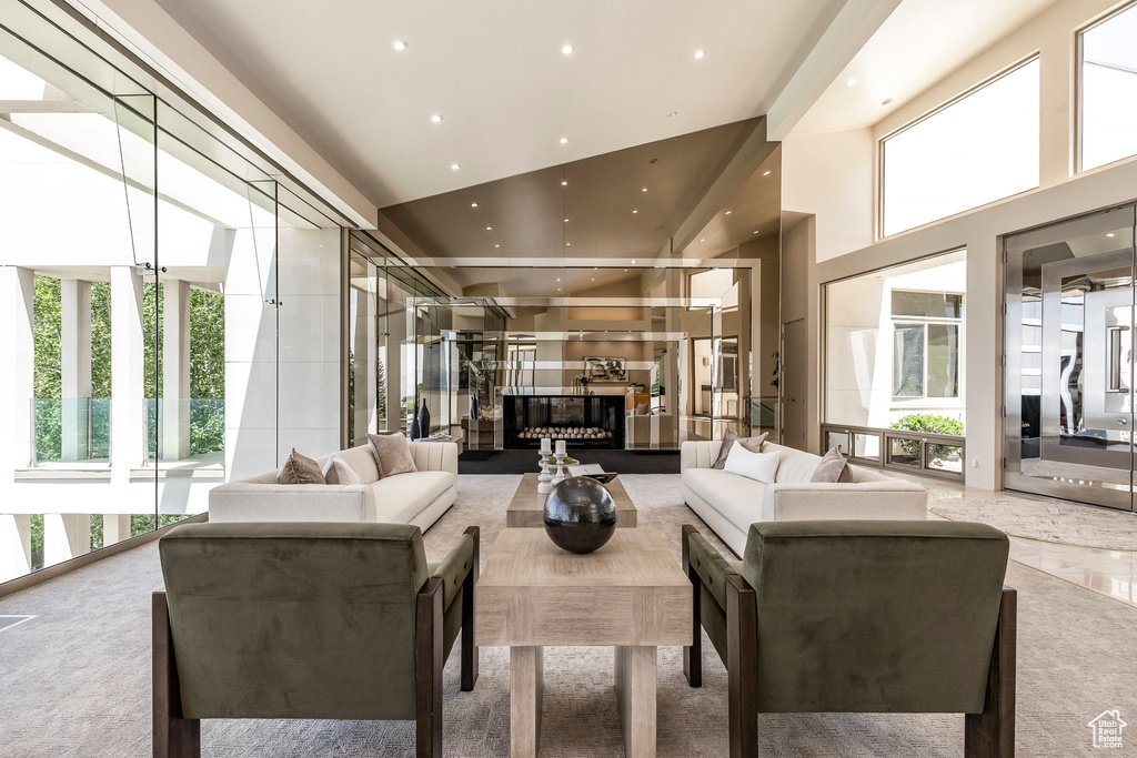 Building lobby with a towering ceiling and recessed lighting