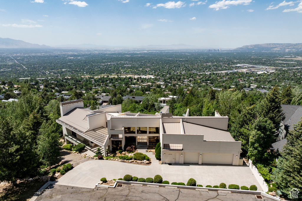 View of subject property featuring a mountainous background
