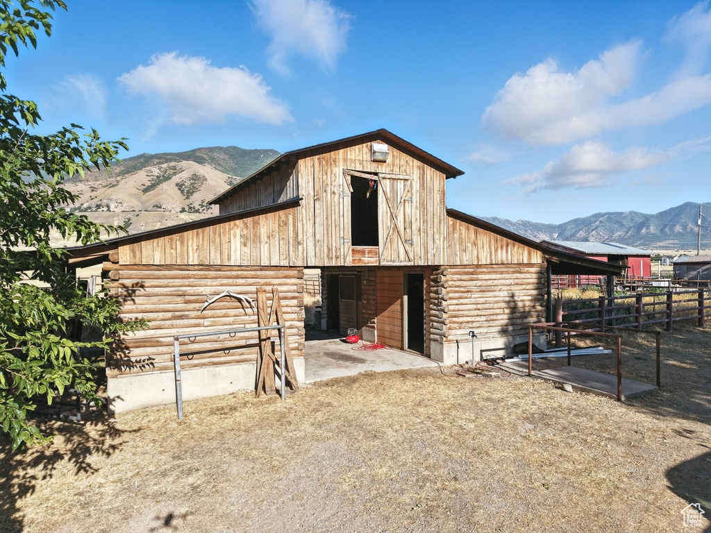 View of barn with a mountain view