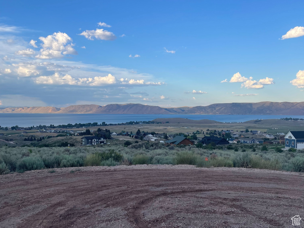 Mountain view featuring a nearby body of water