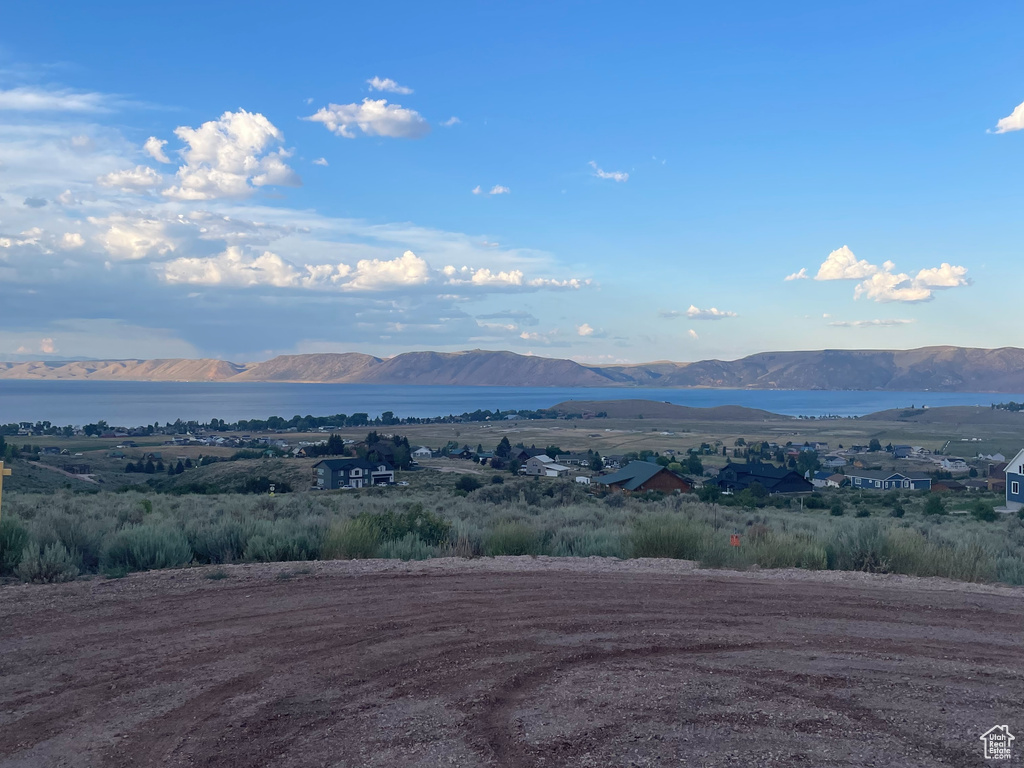 View of mountain backdrop featuring a large body of water