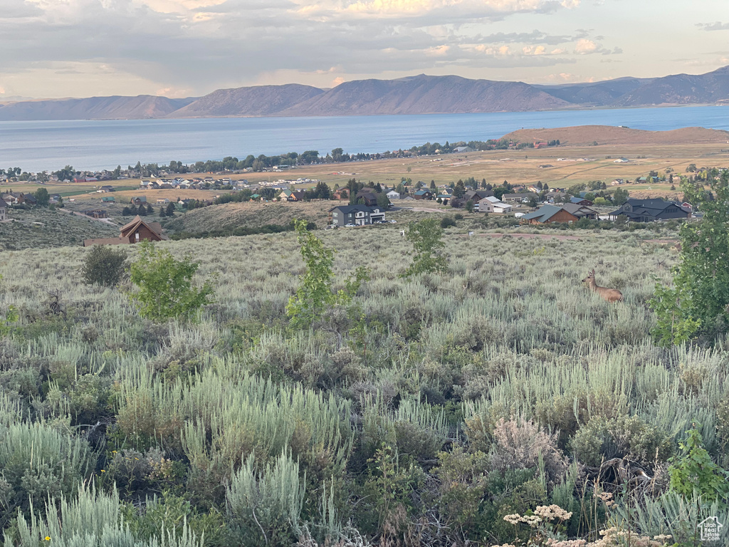 View of mountain backdrop with a large body of water