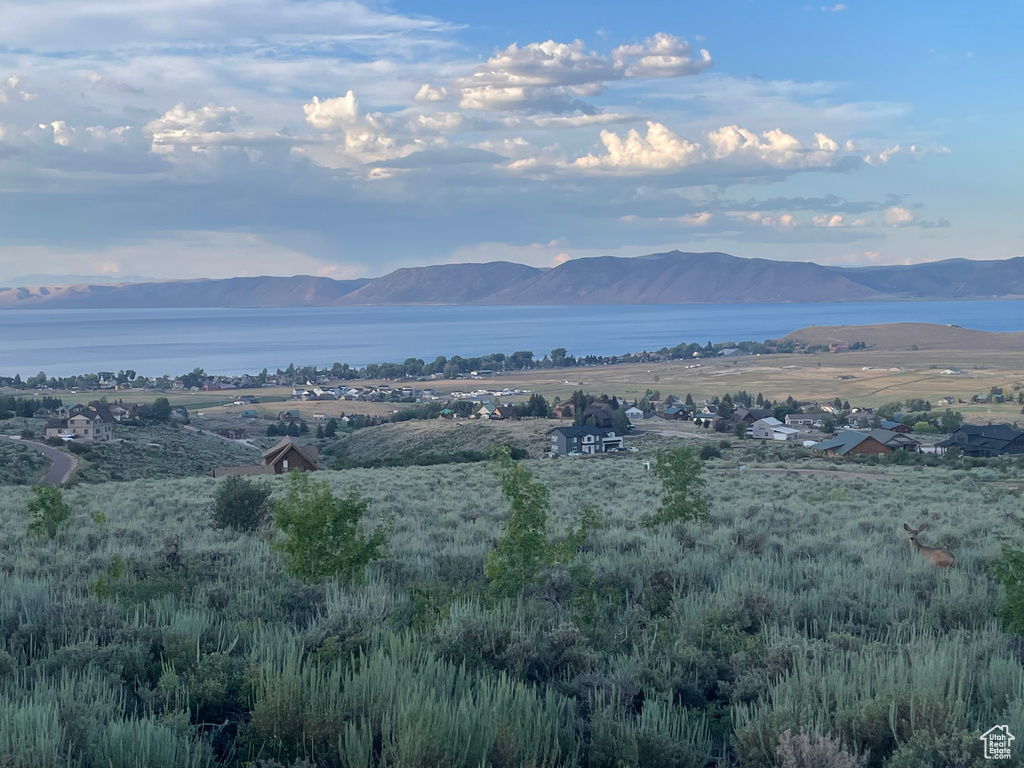 View of mountain background featuring a nearby body of water