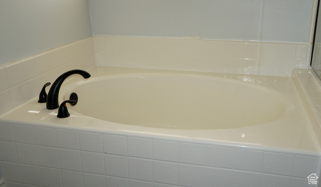 Full bathroom with a bath