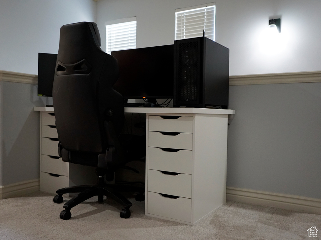 Office area featuring light colored carpet