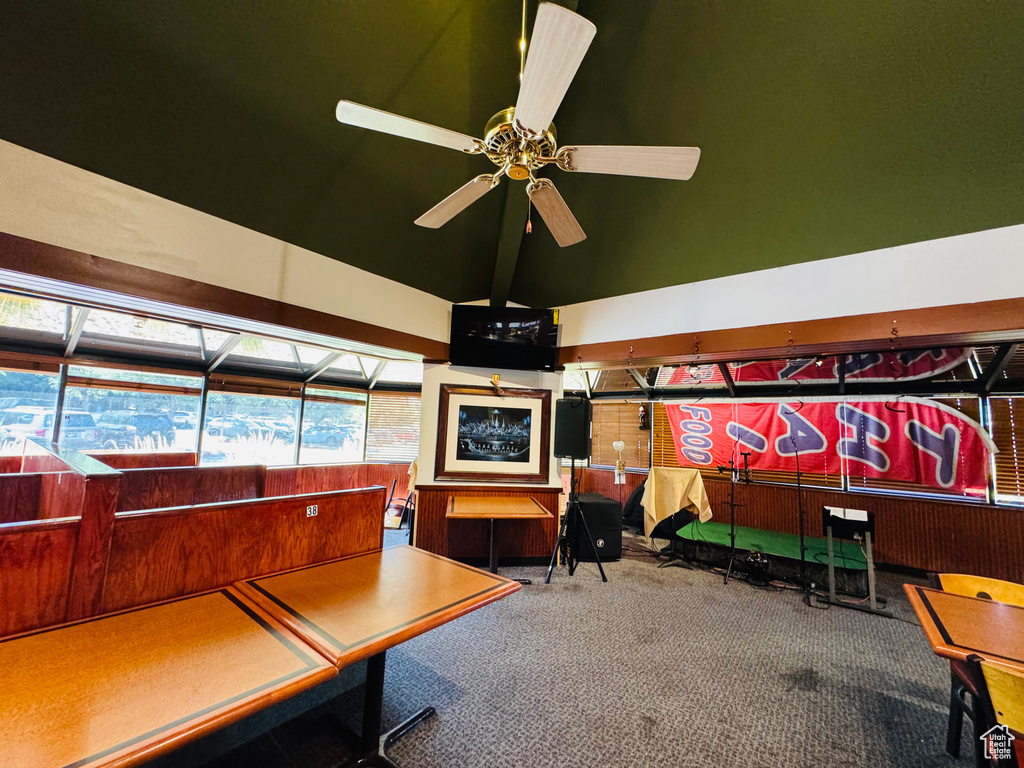Welcome area featuring lofted ceiling