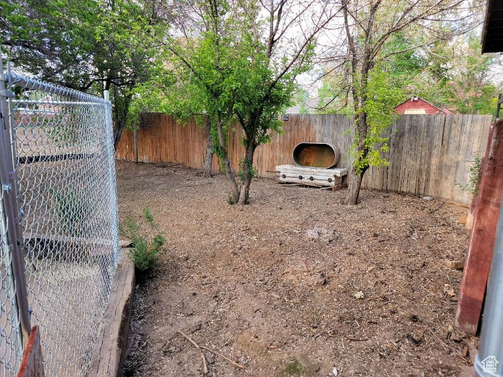 View of fenced backyard