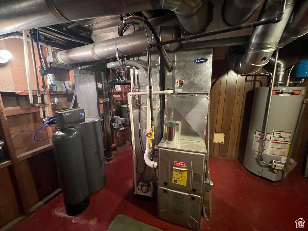 Utility room featuring water heater