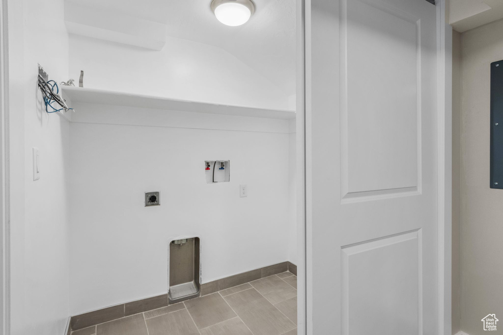 Laundry room featuring washer hookup and electric dryer hookup
