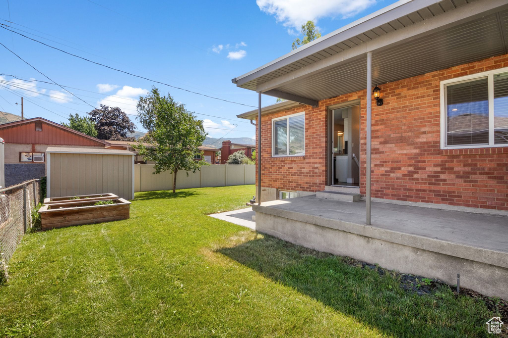 View of yard with a patio area