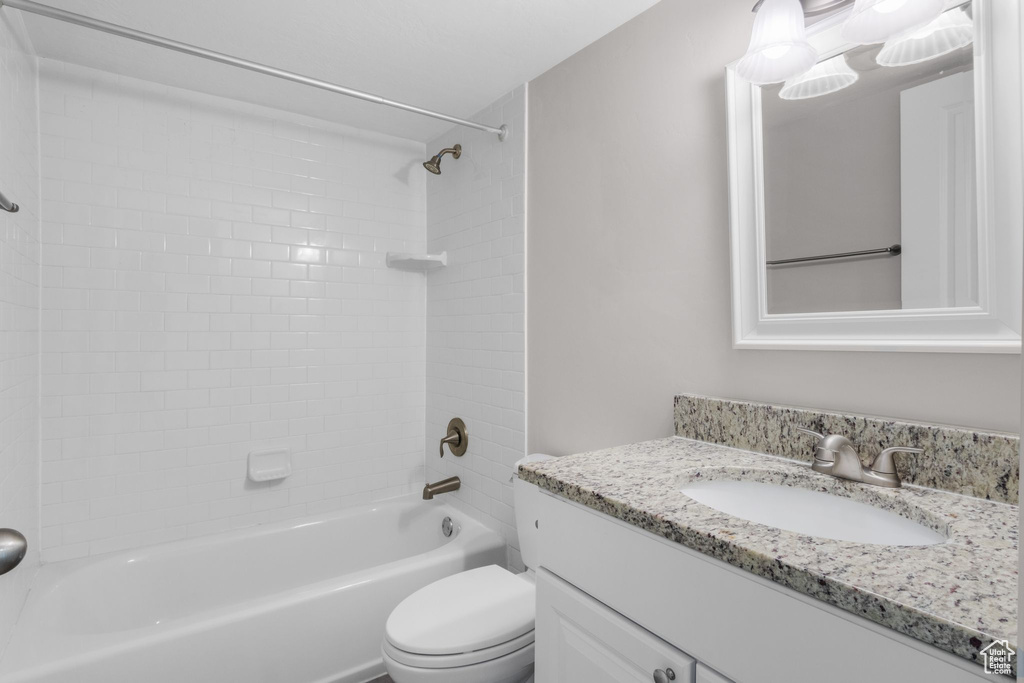 Full bathroom featuring vanity and  shower combination