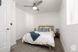 Bedroom featuring carpet floors and ceiling fan