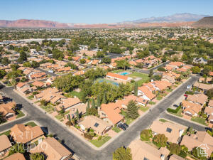 View of property location with nearby suburban area