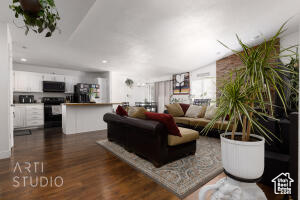 Living area with dark wood-style flooring