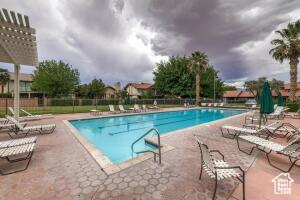 Community pool featuring a patio area