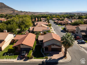 Aerial perspective of suburban area featuring mountains