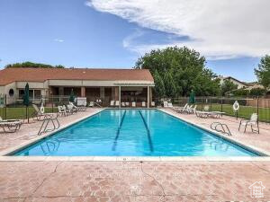 Community pool featuring a patio