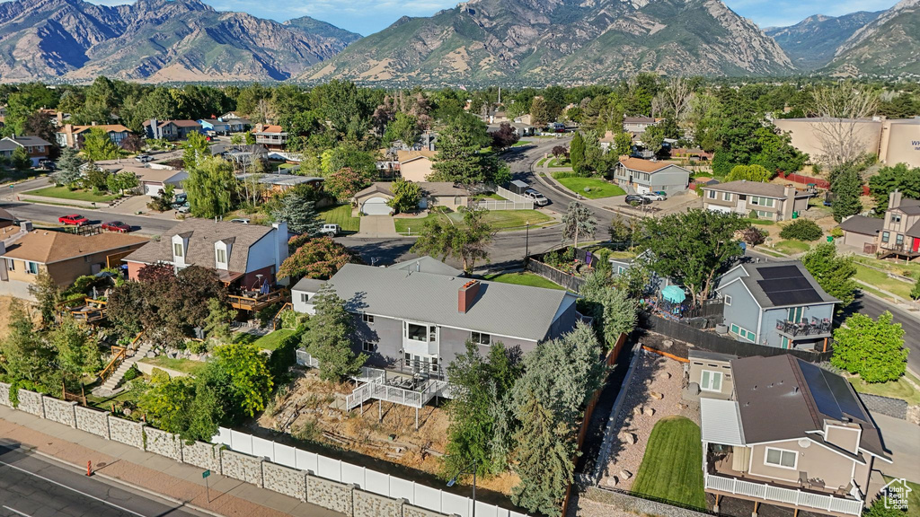 Aerial view of residential area with mountains