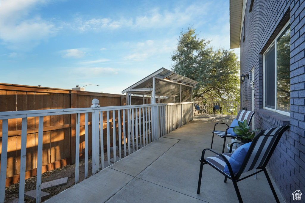Fenced backyard featuring a patio