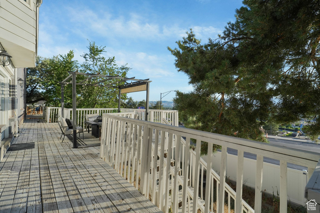 Wooden deck with a pergola