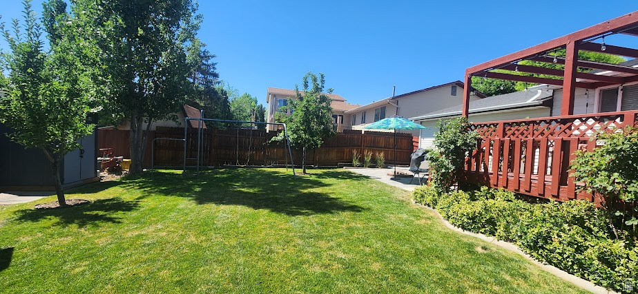 View of yard with a pergola