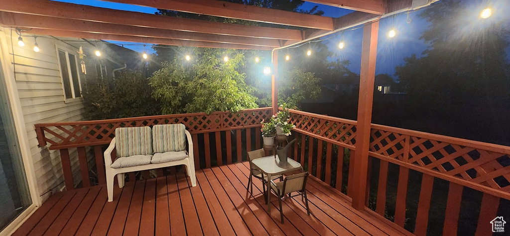 View of deck at night