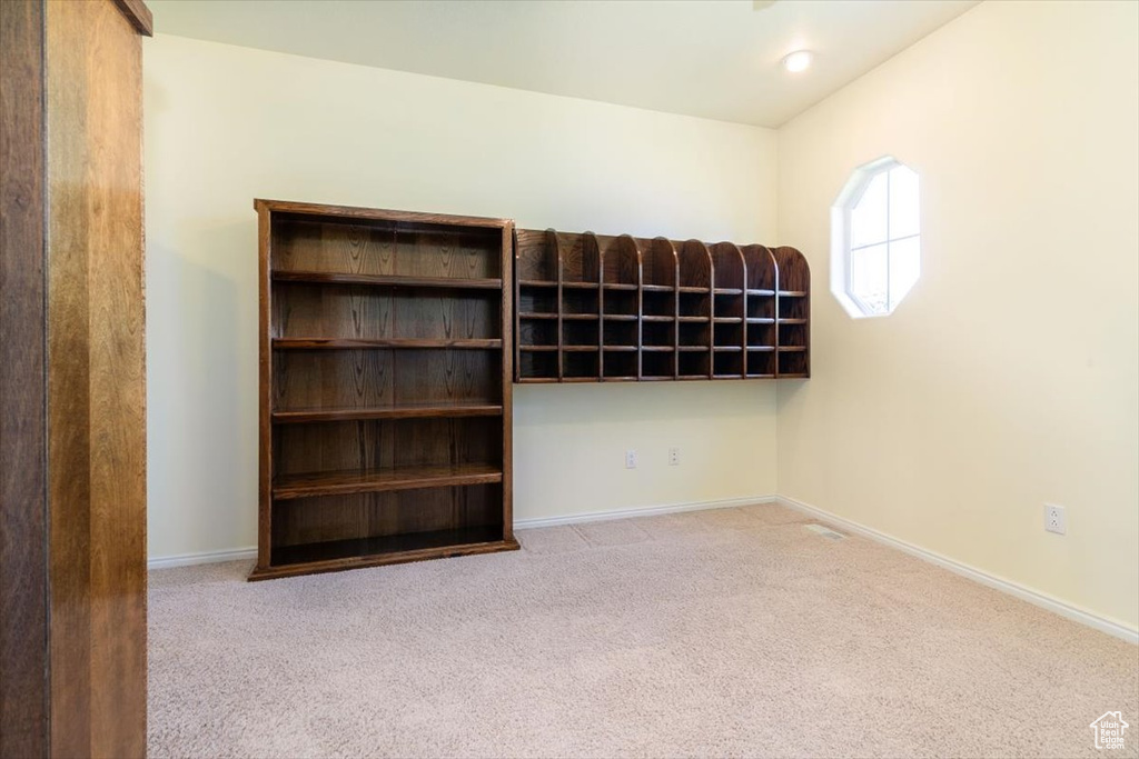 Unfurnished room with carpet flooring