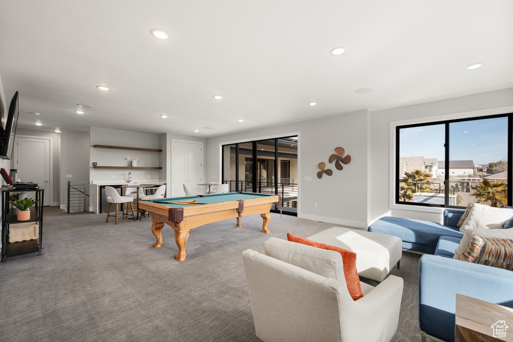 Recreation room featuring wet bar, pool table, carpet flooring, and recessed lighting