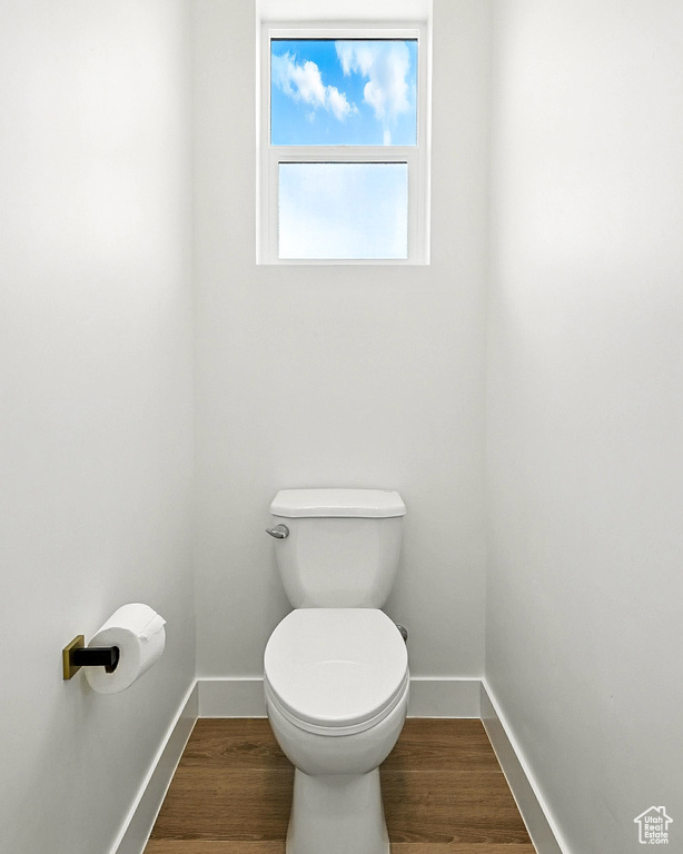 Bathroom featuring wood finished floors