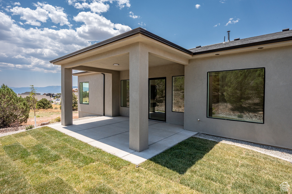 View of patio / terrace featuring a mountain view